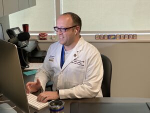 Dr. Bradley meets with a patient during a telehealth visit