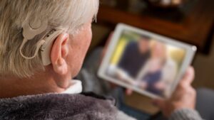 Older man with cochlear implant