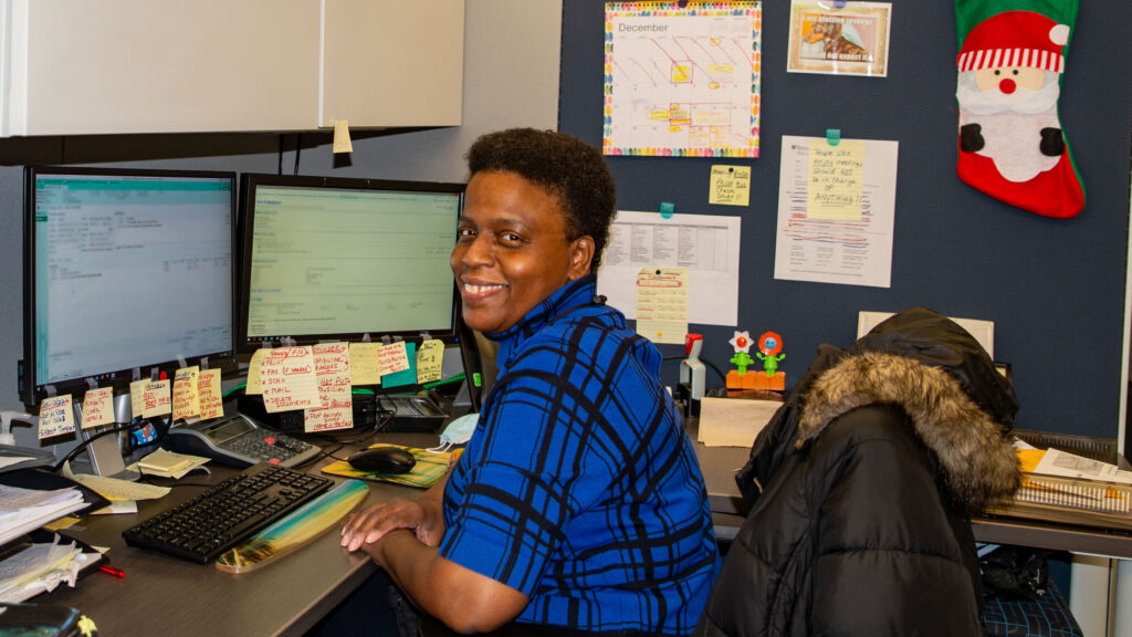 Terri Nelson at her desk