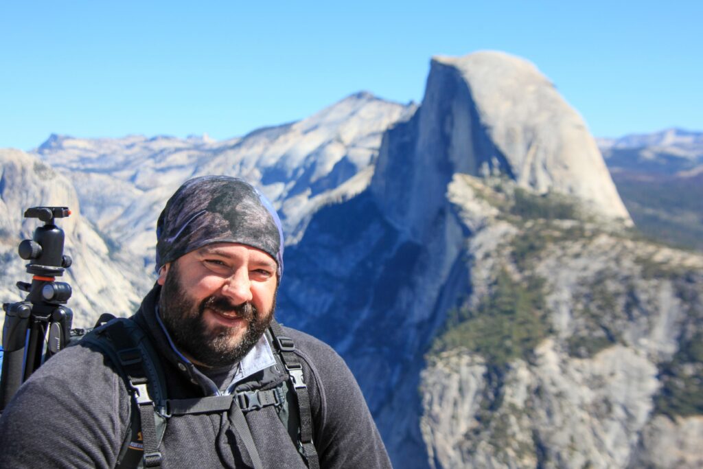 John Schneider in front of Yosemite's Half Dome