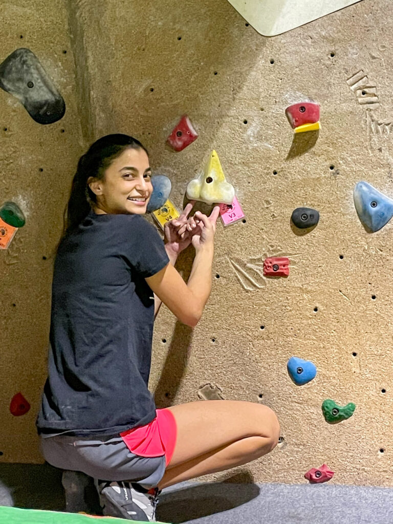 photo of Stephanie at climbing gym