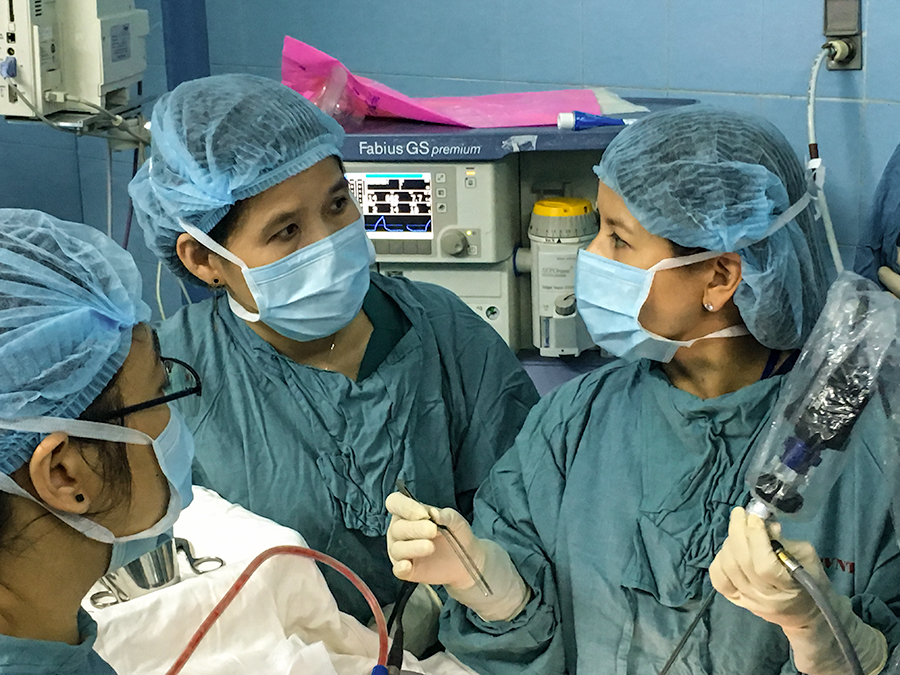 photo of Amber Luong in the operating room