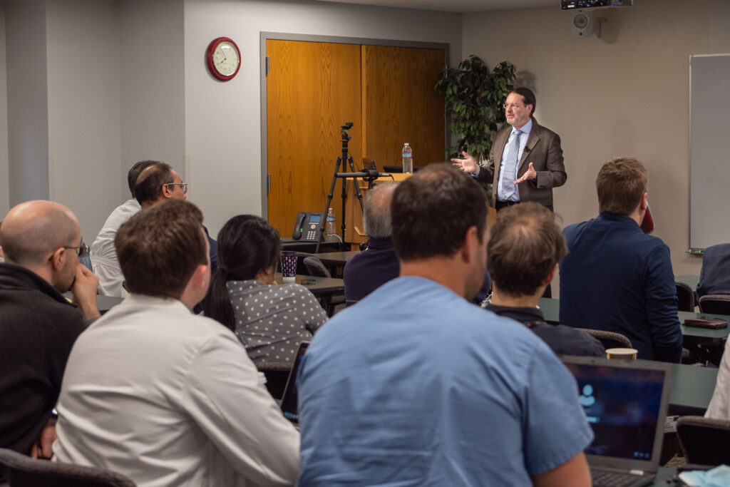 photo of Hayes presenting at Spector Lectureship