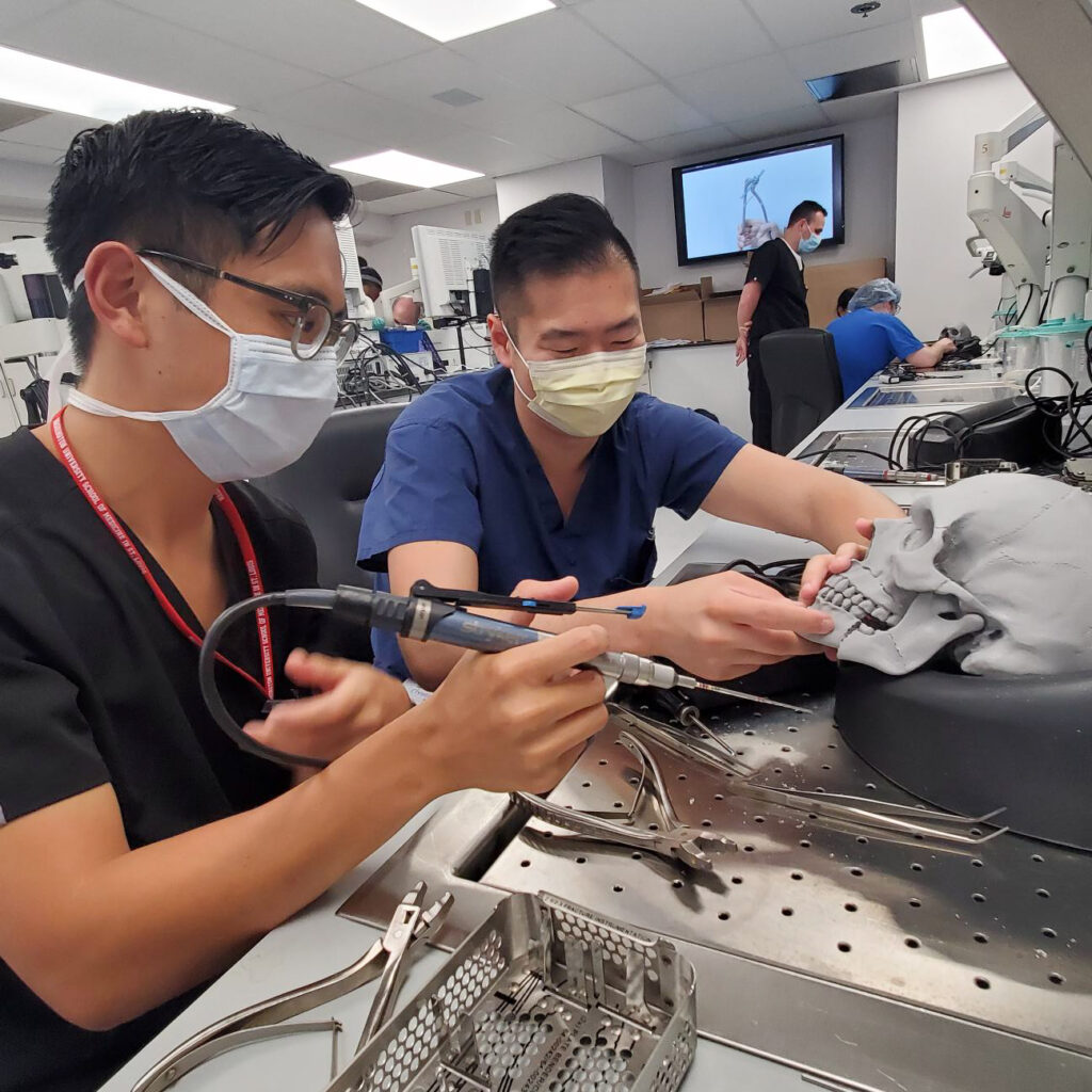 photo of residents practicing plating techniques