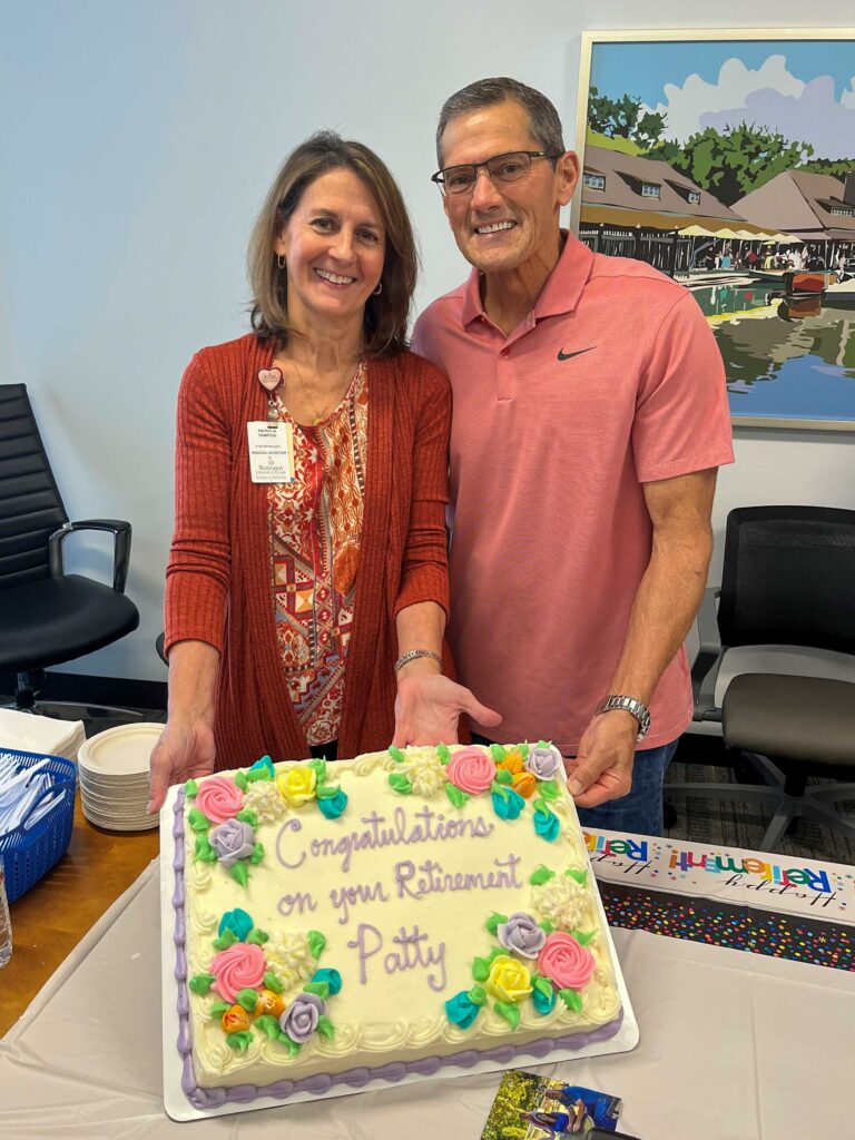 photo of Patty Tampow and huisband Brian at retirement celebration