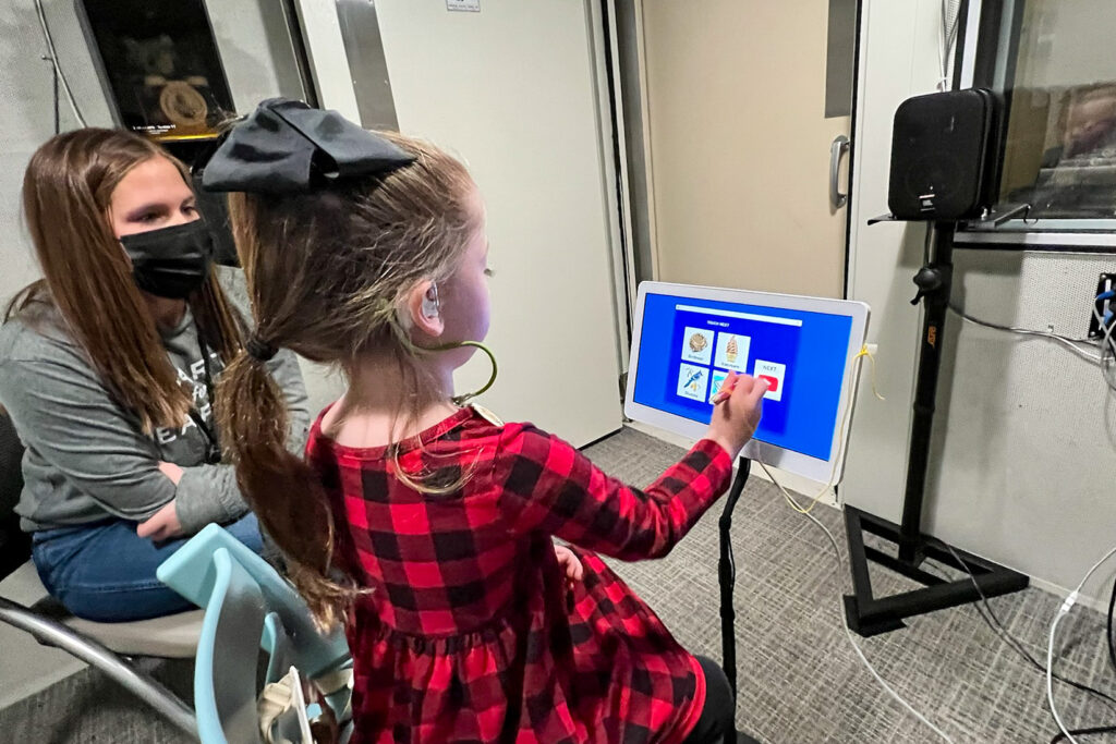 photo of child undergoing word recognition test