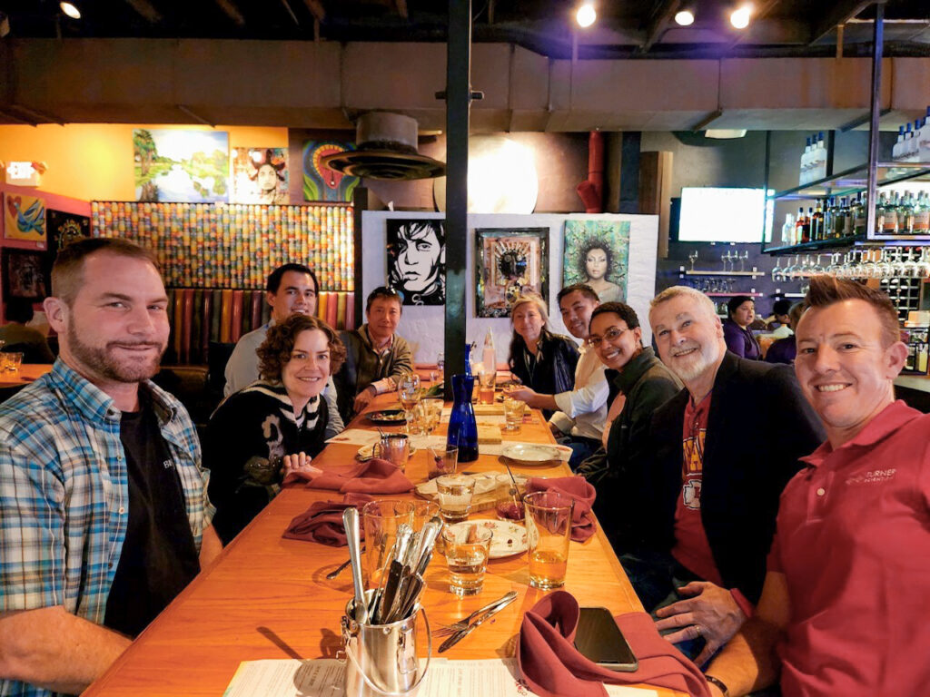 photo of researchers at dinner