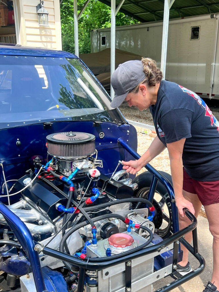 photo of Krekel working on car