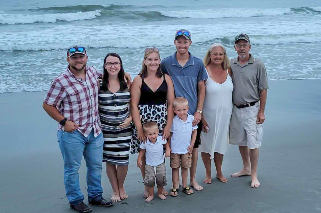 photo of Jackie Pinkerton and family at the beach