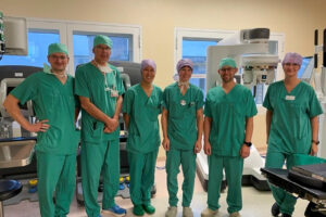 photo of Ryan Jackson with surgical team in Germany