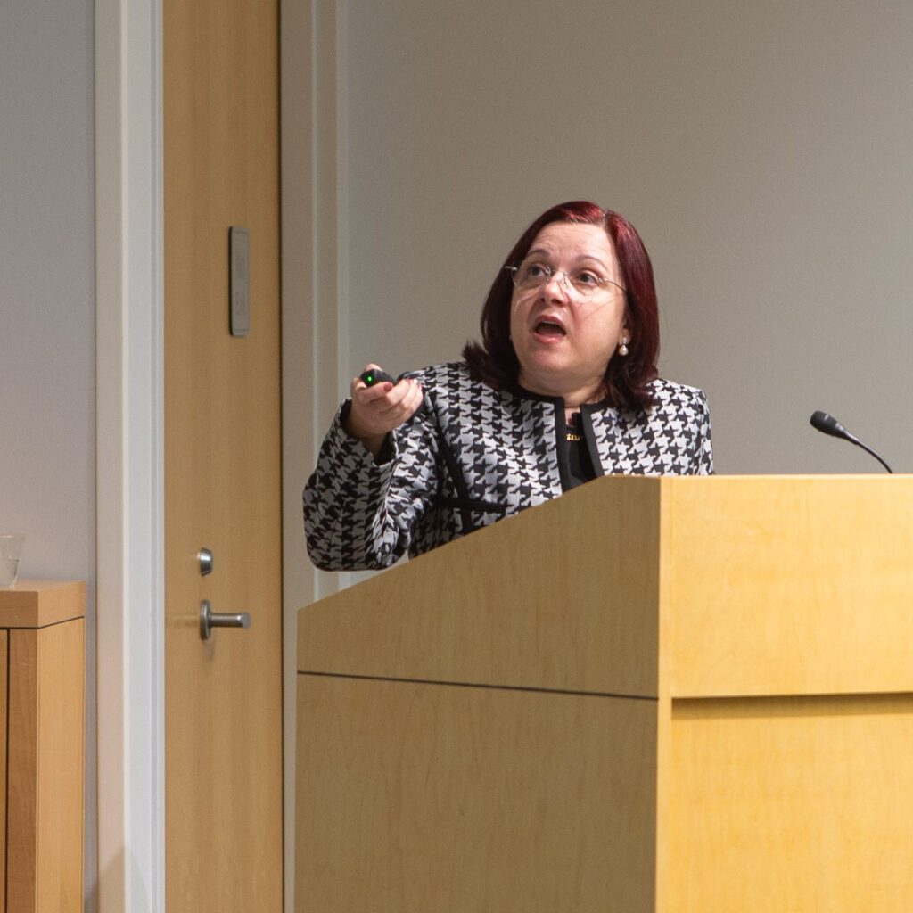 photo of Dorina Kallogjeri presenting at workshop