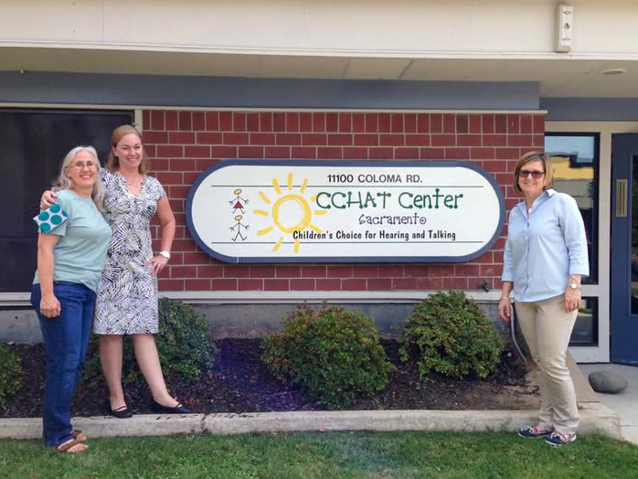 photo of Davidson with lab members at a testing visit