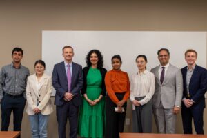 photo of presenters at research symposium