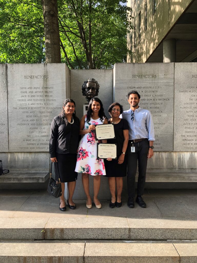 Tharakan and family at medical school graduation