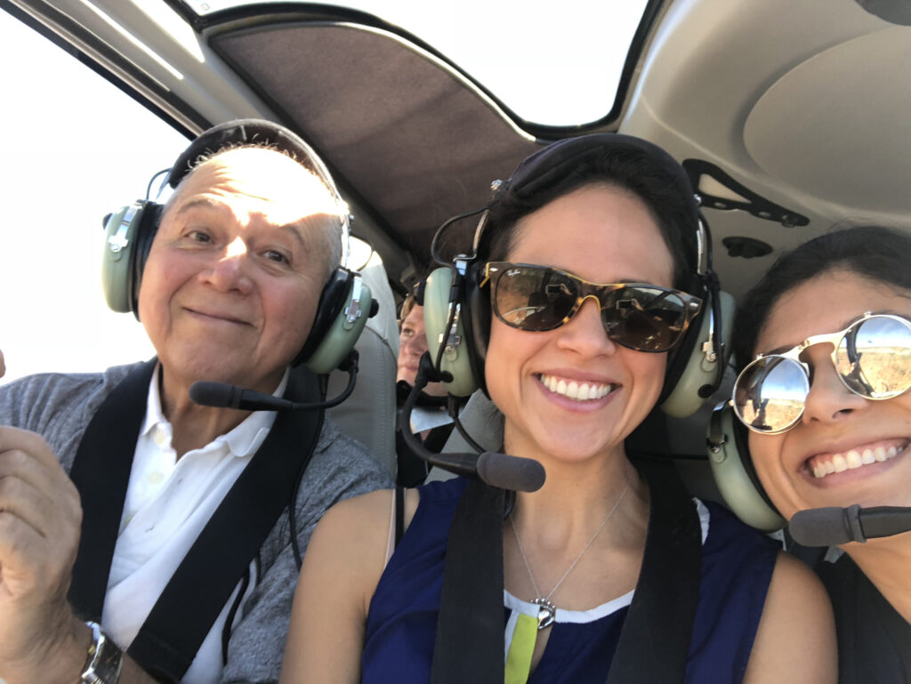 photo of Valenzuela with father and sister in helicopter