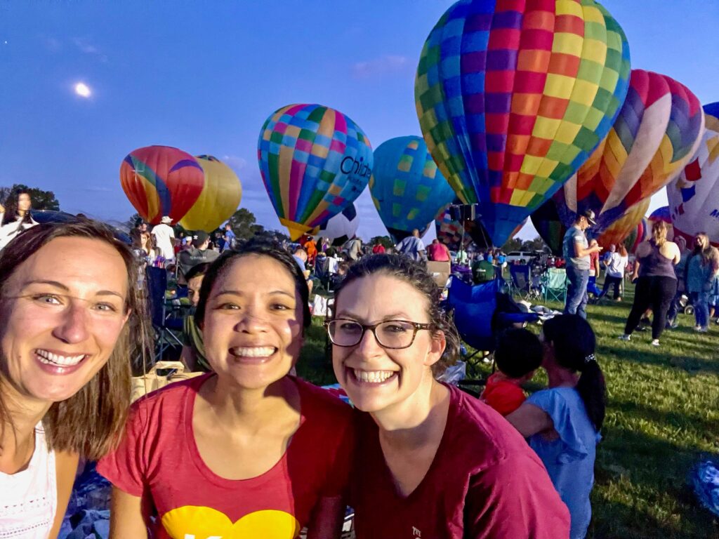 photo of Miranda Lindburg and co-residents at St. Louis Balloon Glow.
