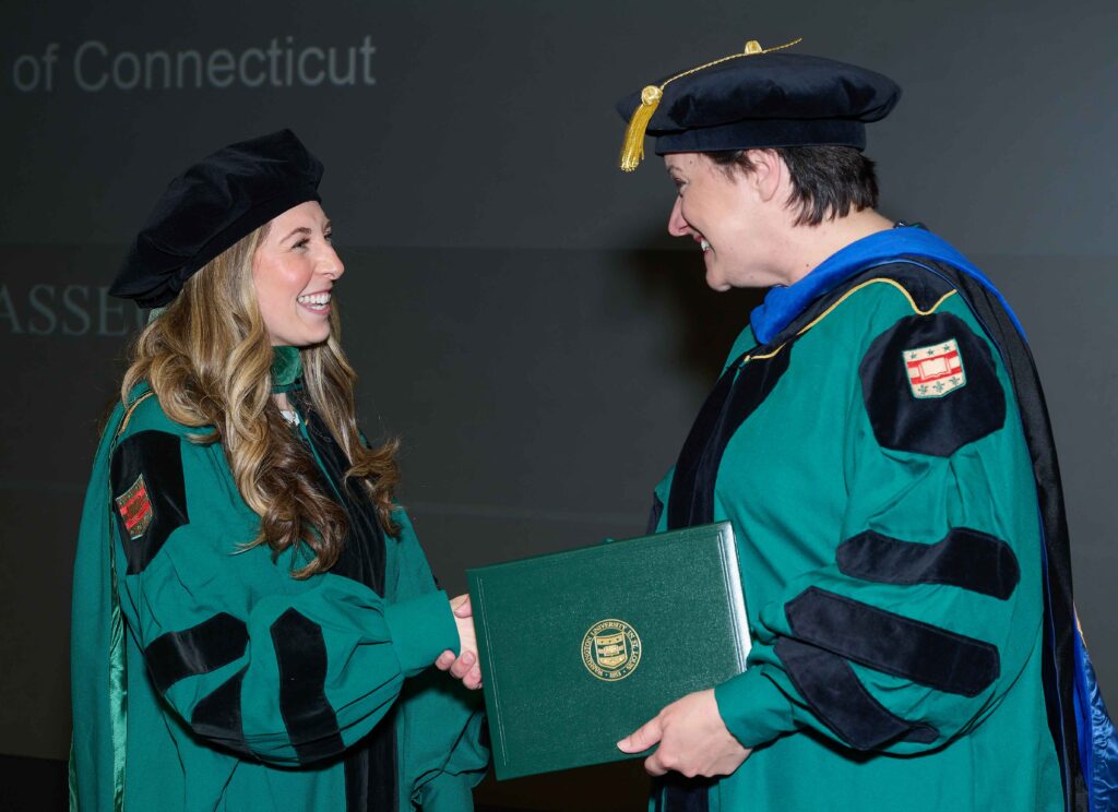 photo of student receiving diploma